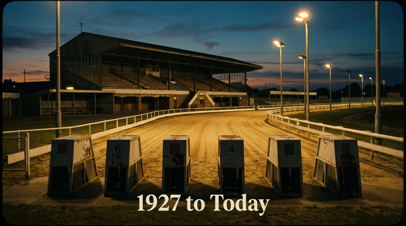 Historic greyhound racing scene at White City Stadium under floodlights